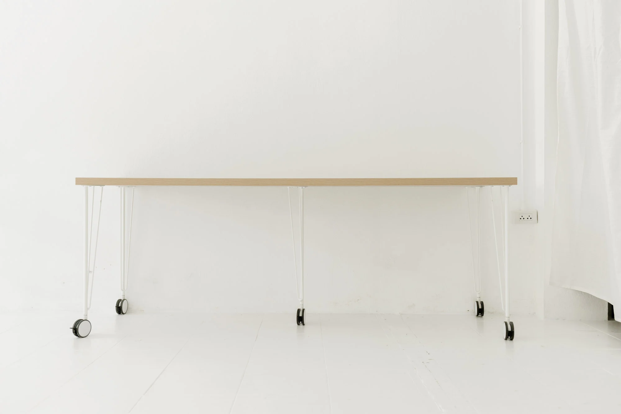 Minimalist product photography shot against a clean white background in our Chiang Mai studio